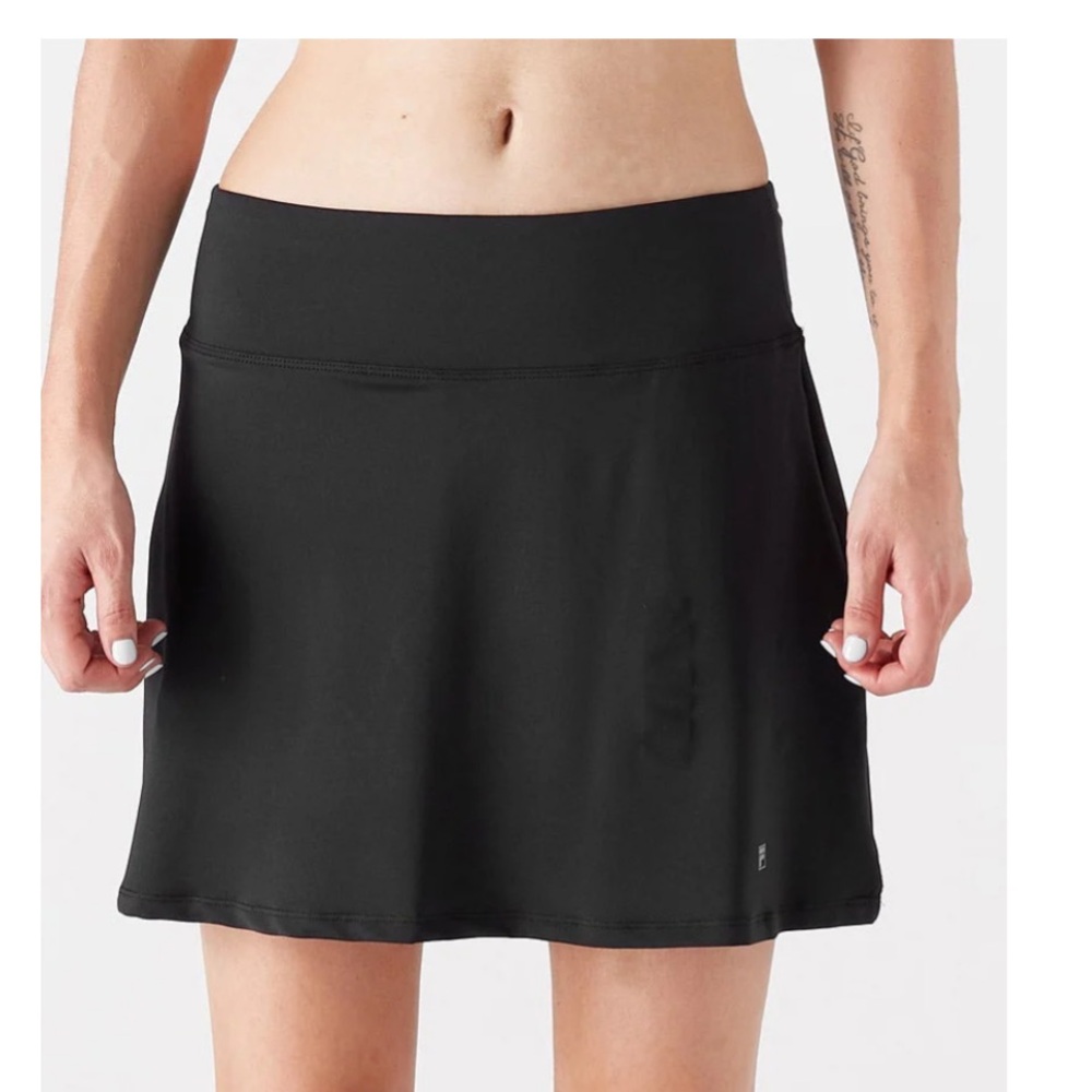 Fila dark blue skort size L.